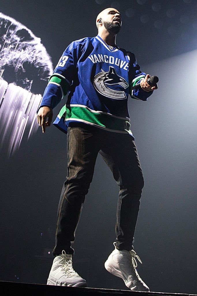 Drake performing wearing vancouver jersey with Nike huarache run ultra white